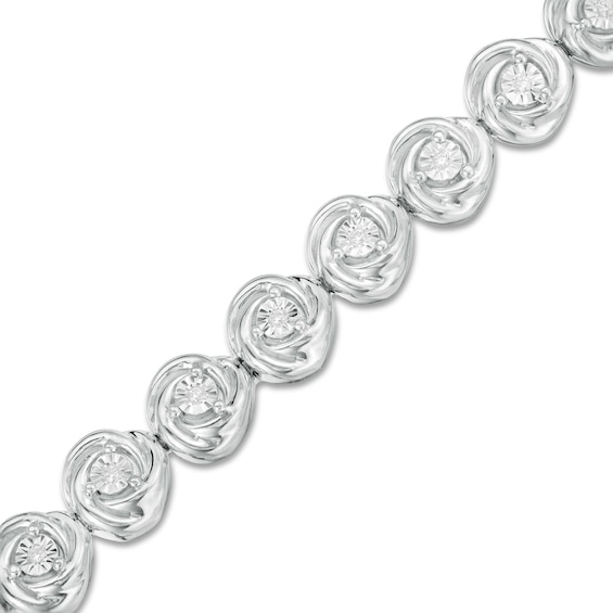 0.086 CT. T.w. Diamond Love Knot Tennis Bracelet in Sterling Silver -