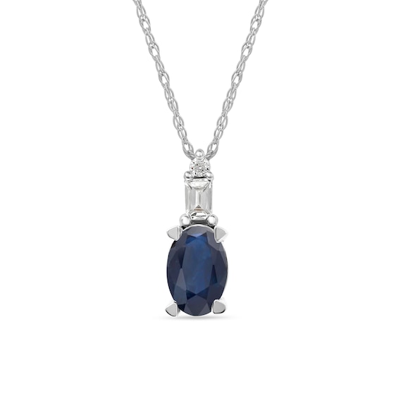 Oval Blue Sapphire and 0.05 CT. T.w. Baguette and Round Diamond