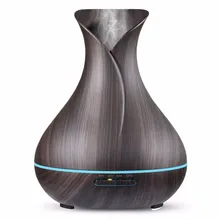 Transform Your Space with a 400ml Ultrasonic Aroma Diffuser Vase – 7 Color LED Lights & Air Humidifier for Just .65!
